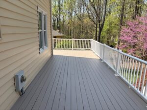 image shows an outdoor deck made of Azek Slate Gray decking