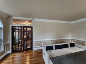 image shows an interior view of a room featuring a sofa bed
